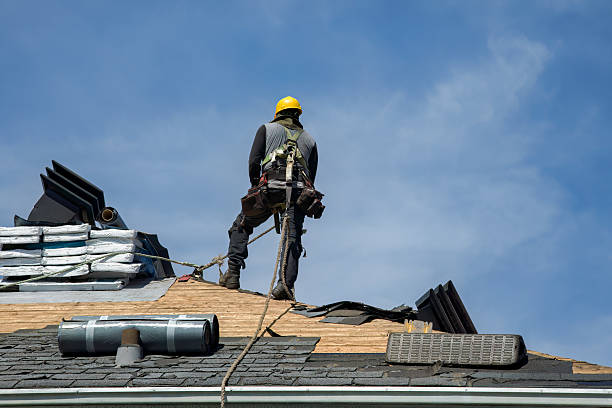 Professional Gutter Installation technician working in Tacoma, WA